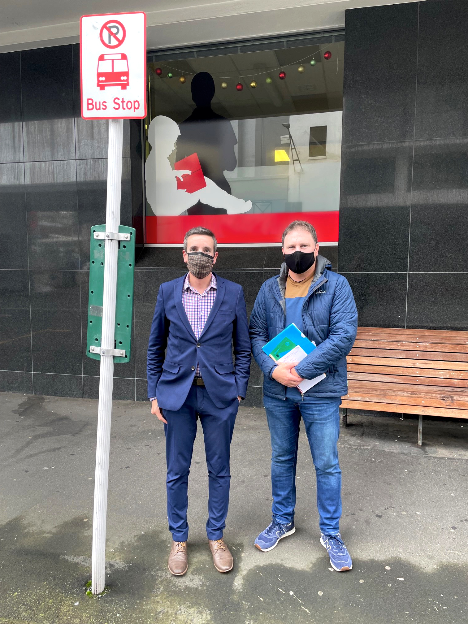 ORC Implementation Lead Transport, Julian Phillips (left) with Kaikorai Valley College Assistant Principal Mike Waterworth (right) at the bus stop outside Philip Laing House.