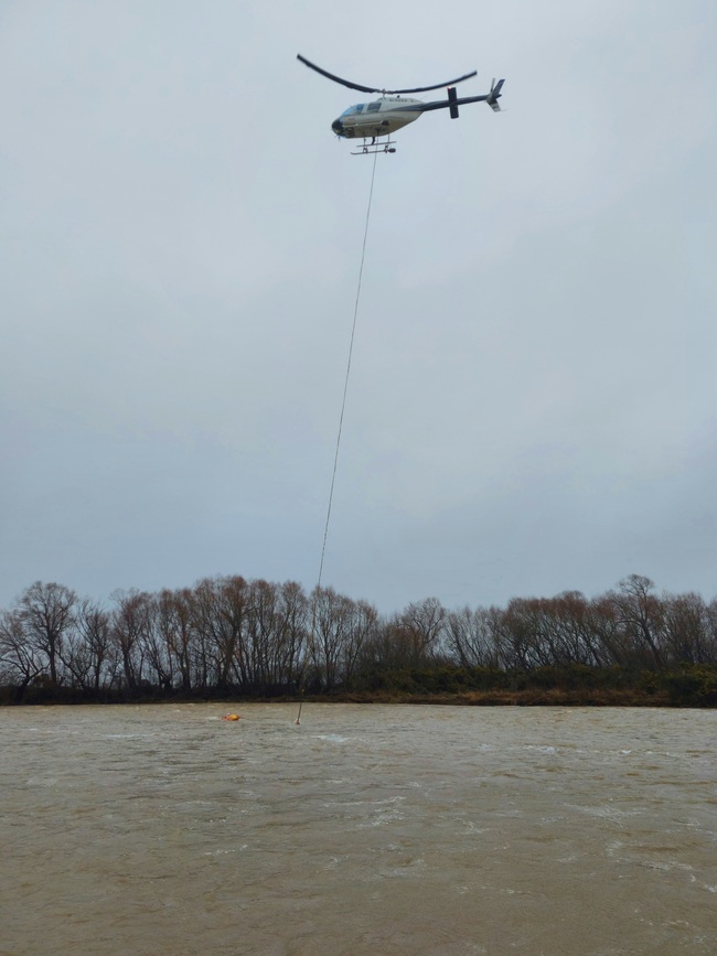 Helicopter gauging river flow north otago