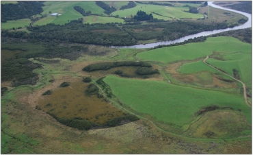 Aerial view of Stuarts Marsh (back), with part of Tahakopa River Bogs in the foreground (2008)