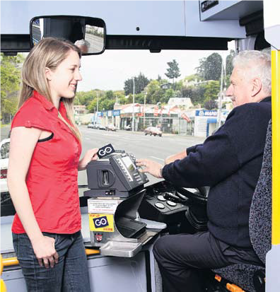 Lady getting on a bus