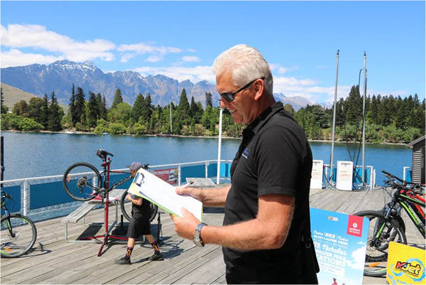 Trevor Andrews (Otago Emergency Management Officer for Queenstown Lakes) updating contact details of business owners within the Lake Wakatipu flooding area.