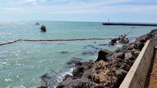 A rapid deployment boom around a vessel at Oamaru in 2017.