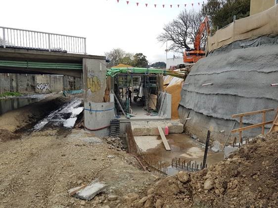 a construction site beneath dundas street bridge