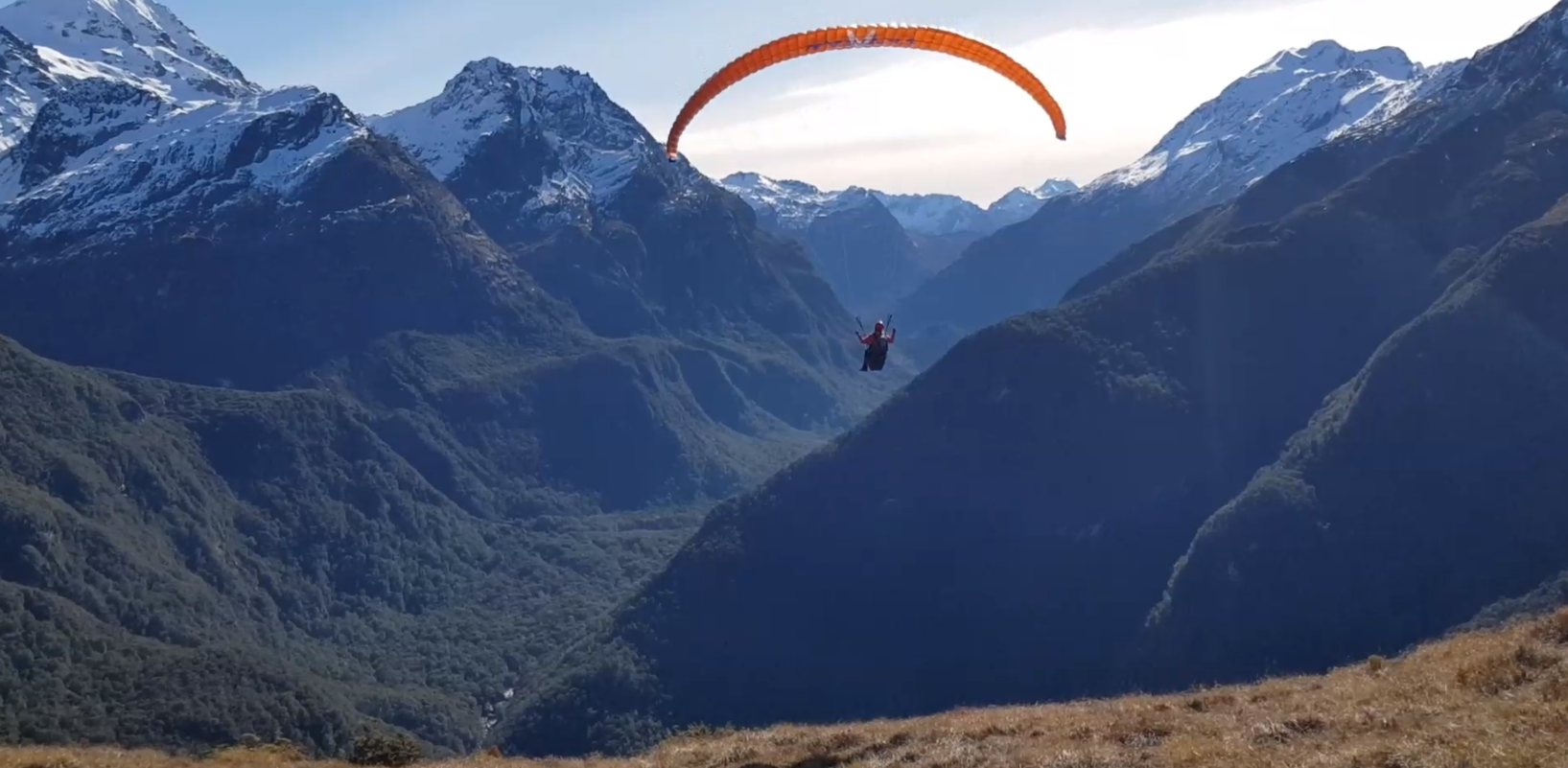 Melanie paragliding from Sugarloaf Saddle, August 2020