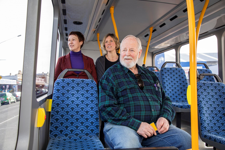 Dunedin passengers (from left) Janie Peck and Robyn McLean sit behind Neil Grant.