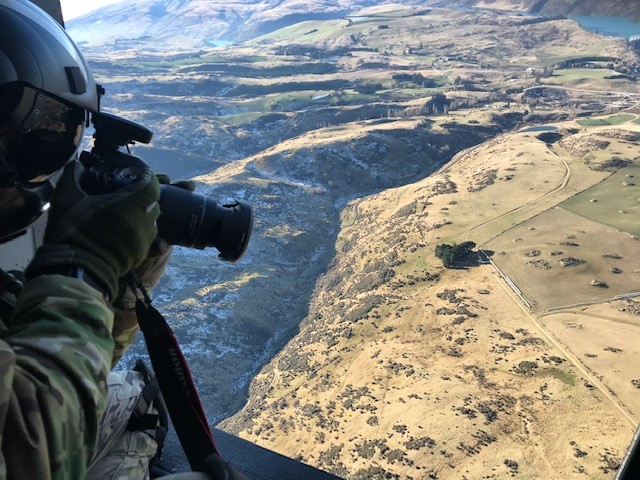 Monitoring the spread of wilding conifers from an RNZAF helicopter earlier this year, as part of the National Wilding Conifer Programme.