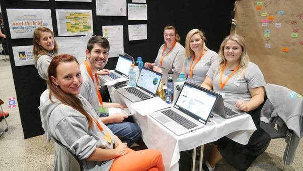 ORC’s Australasian Management Team, “In Our Element”. Left, from rear: Marianna Brook, Soren Olsen, Jasmin Lamorie; right, from rear: Shelby Donald, Rachel Bird, and Team Captain Alexandra King.