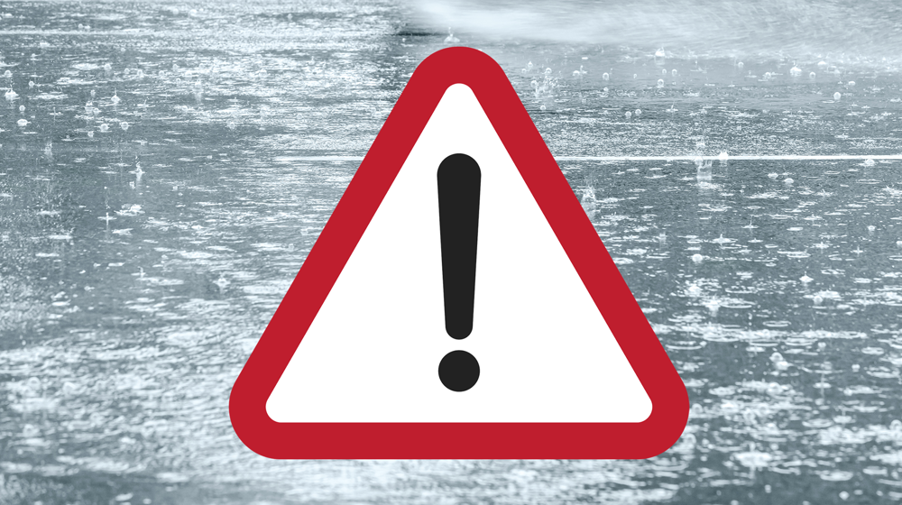 Exclamation on rainy background