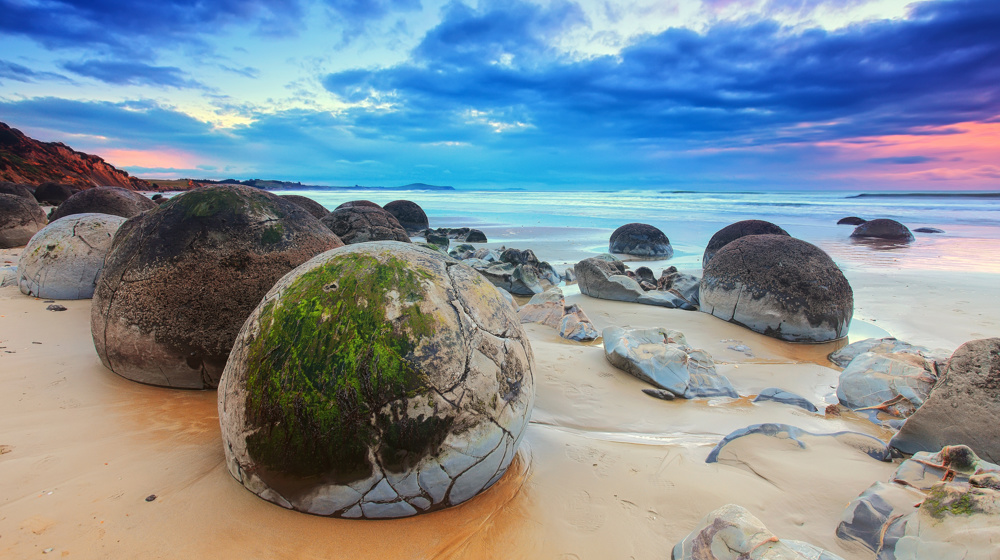 Cloudy Sunrise At Moeraki Boulders Adobestock 418702332